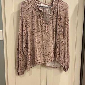 Women’s lt pink animal print long sleeve blouse, size medium.